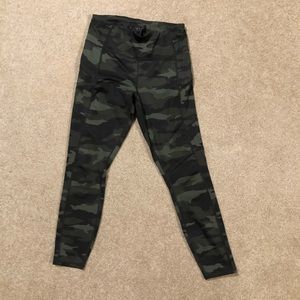 Athleta 7/8 camo leggings. Zip on each side.